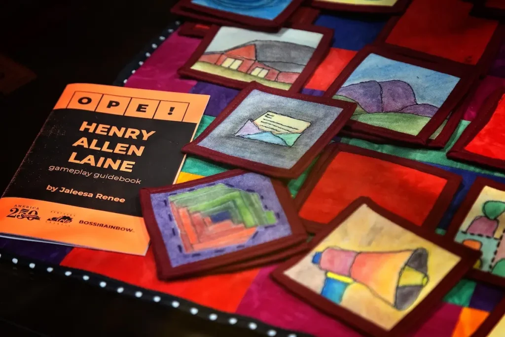 Showing the handmade game that Dr. Jaleesa Wells made to share history.