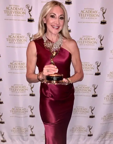 Jane Clauss with an Emmy