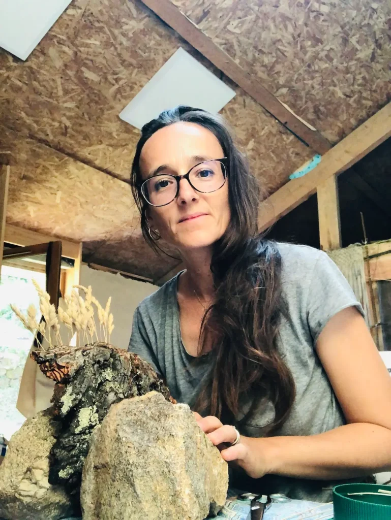 Julie LaForet working with some plant materials