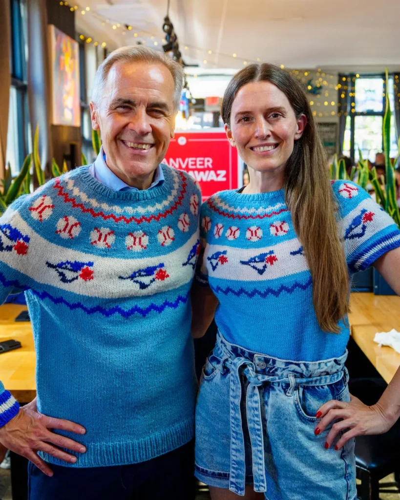Karla Courtney with Prime Minister Mark Carney in Blue Jays sweaters