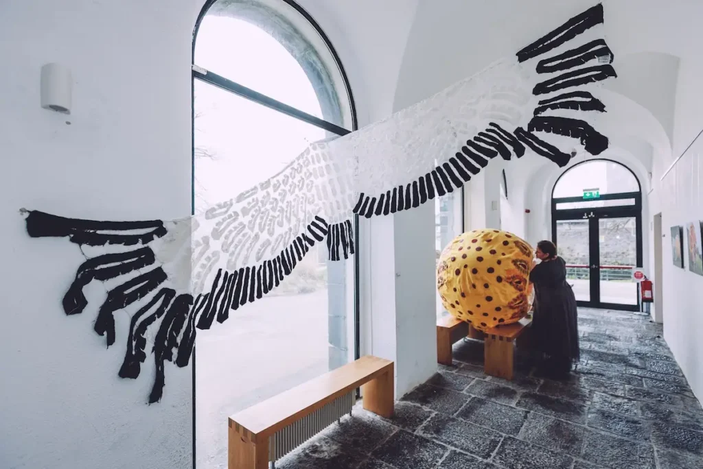 Symbols of Mobility: Felt Exhibition art by Niki Collier