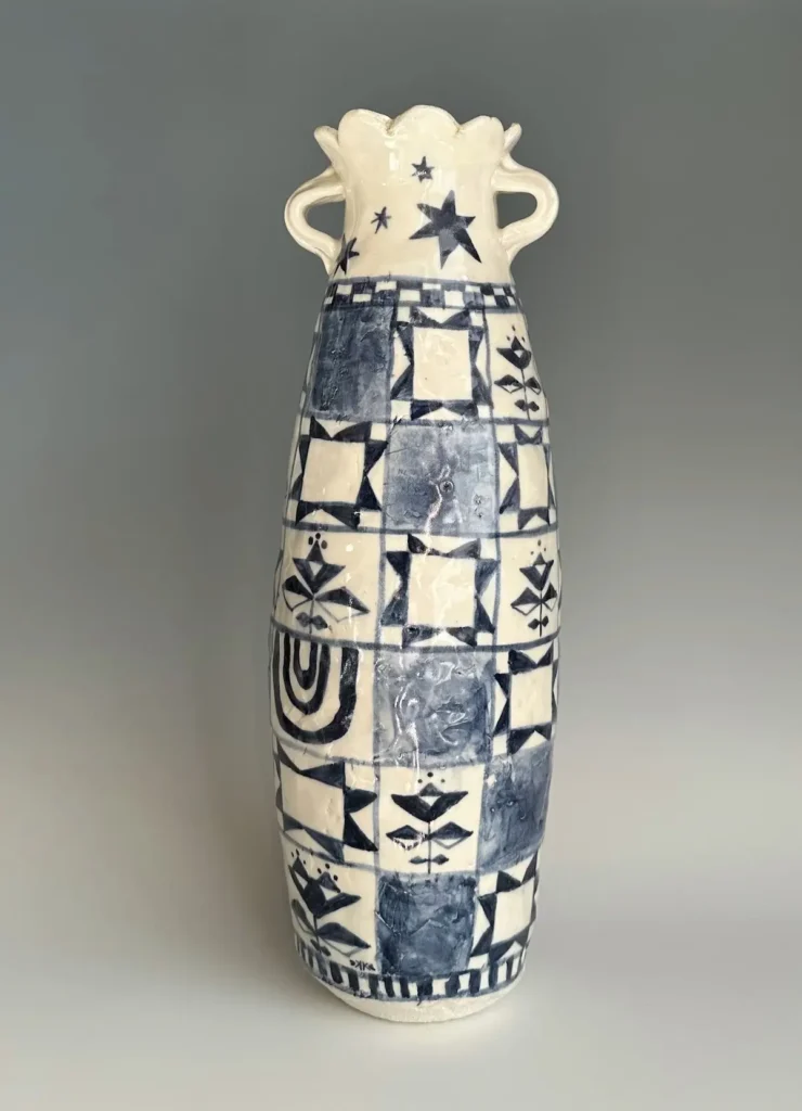 Tall blue and white quilterly pottery vase by Summer Brendlinger