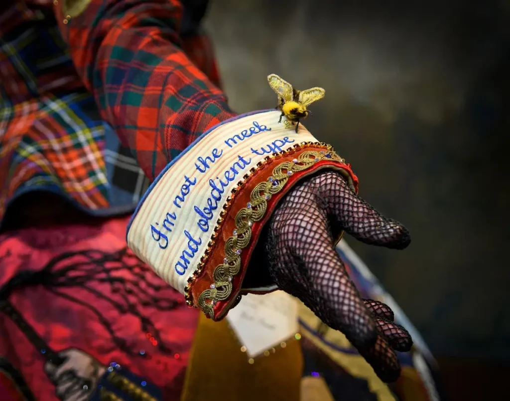 Details on cuff of patchwork dress made by Teri Biglands