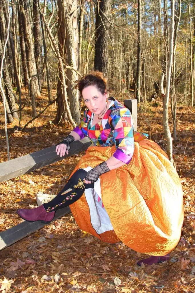 Teri Biglands showing her sock and sword on her Sassenach on Frasers Ridge garment
