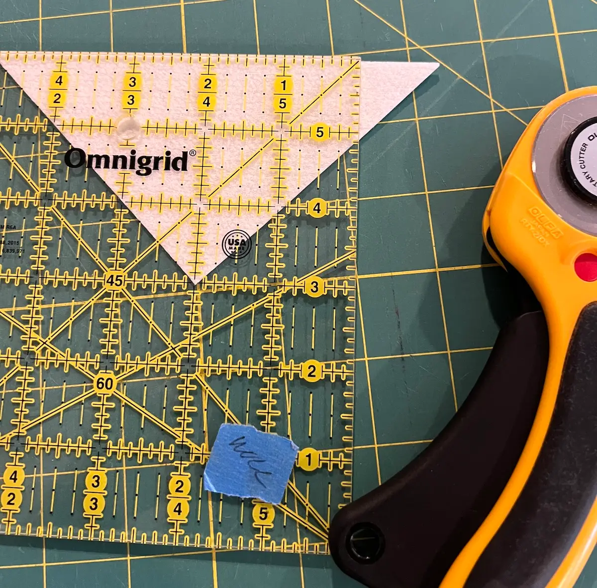 Trimming the corners off of the sides of the box top
