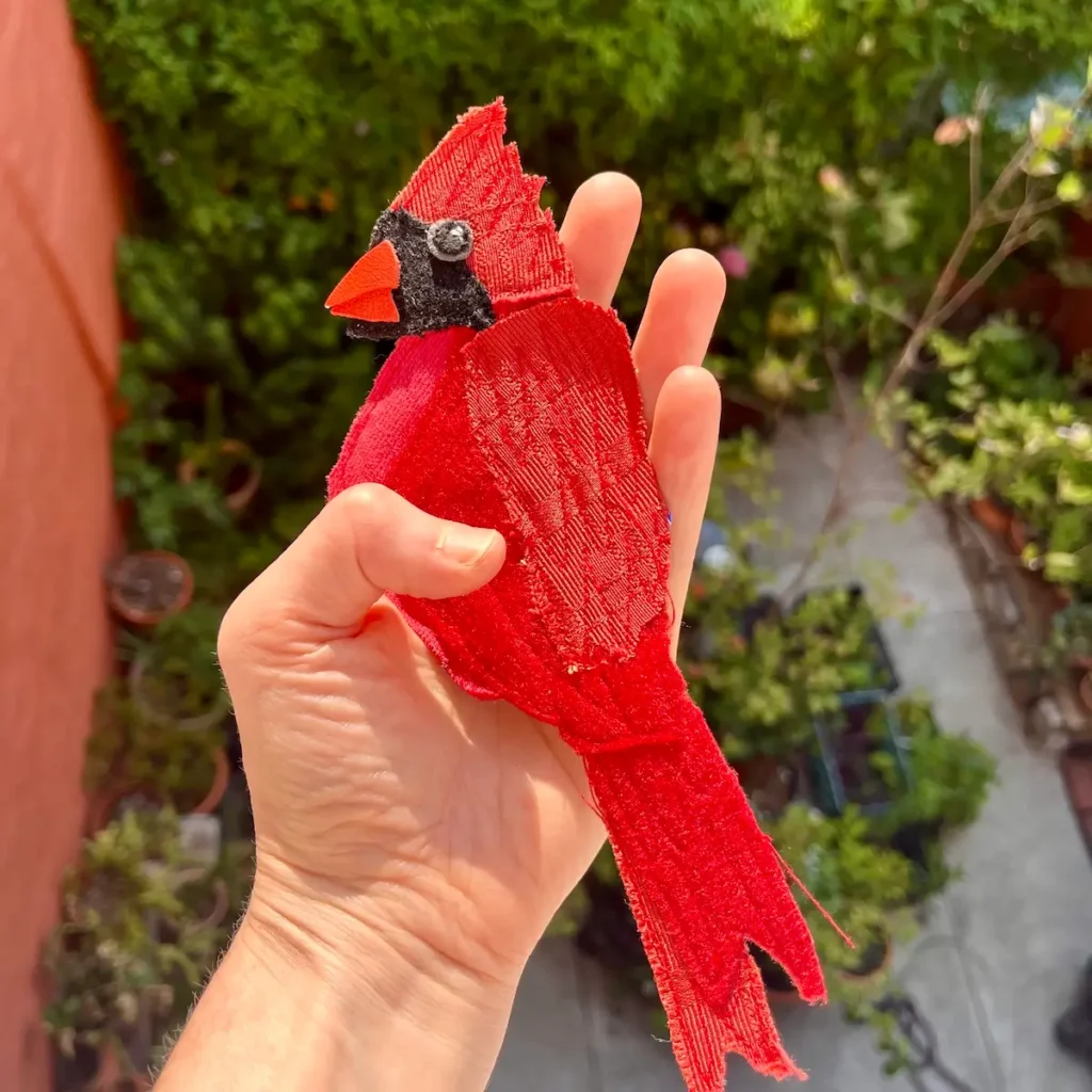 Fiber cardinal by Julie Woodard