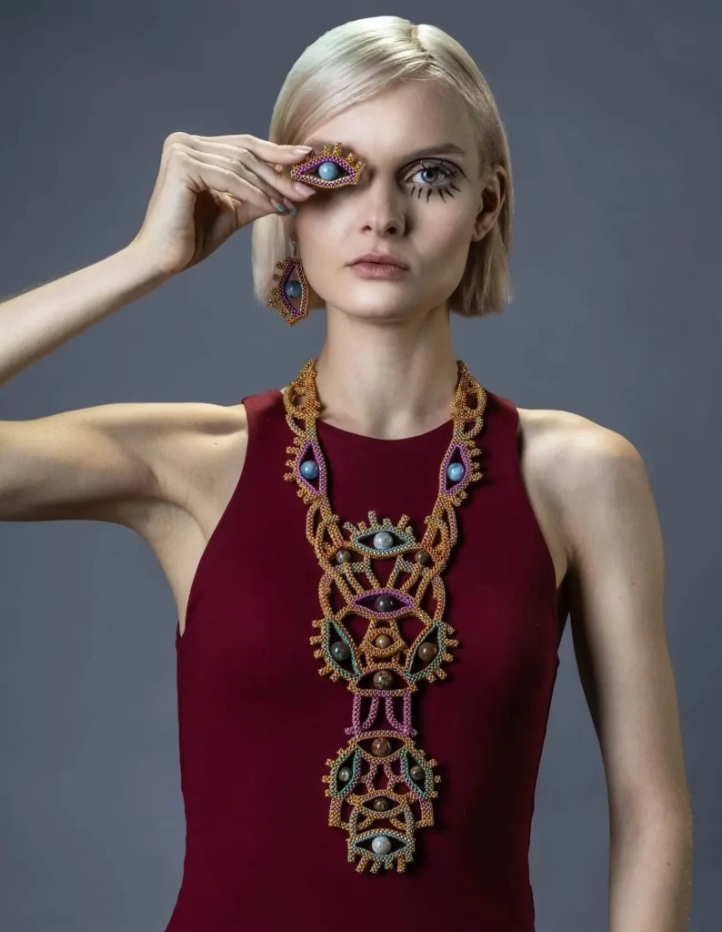 We are watching you beaded necklace by Maracole Bijoux