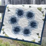 Hexies in Bloom finished on a rail fence by Marie-Elise McNeeley