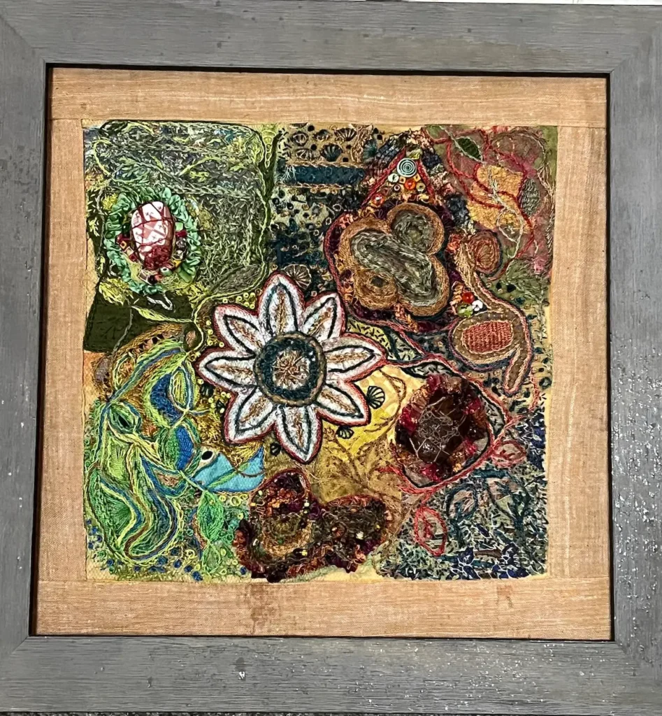 Flower fiber art by MaryAnne Lupinetti