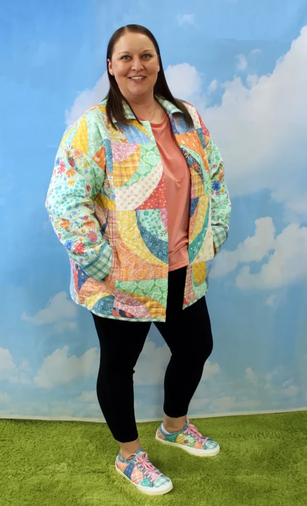 Natalie Buxkemper in a quilt coat with matching kicks that she made