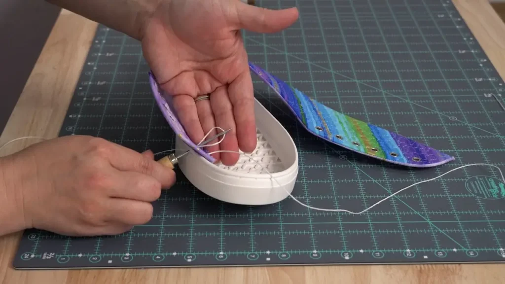 Part 1 of showing how to sew the fabric to the sole by Natalie Buxkemper
