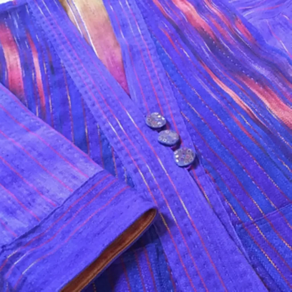 Silk coat with three buttons made by Sara Lamb