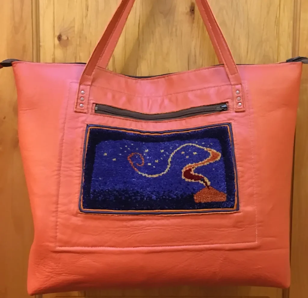 Leather bag with knoted pile insert made by Sara Lamb