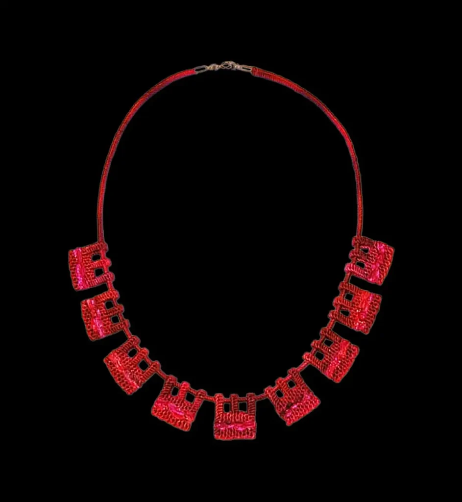 Red woven necklace by Vanina Bujalter