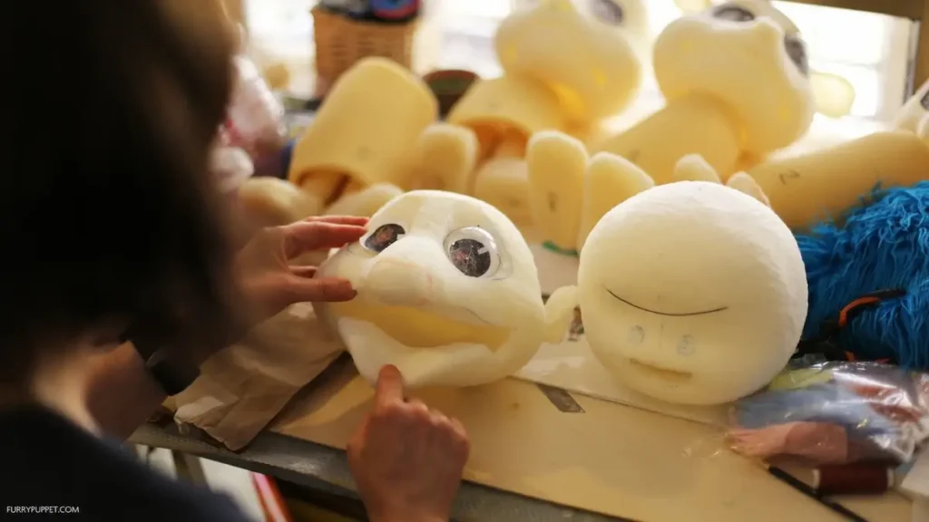 Carved puppet heads for custom projects by Zach Buchman