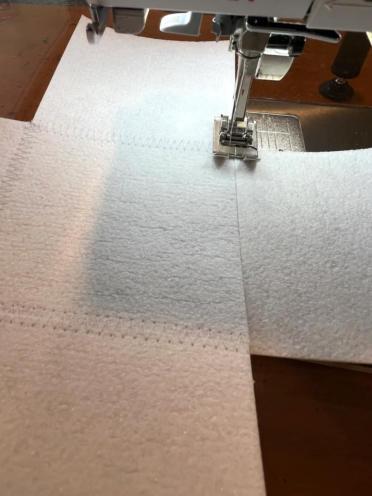 Sewing the peltex together for the base of the fabric box