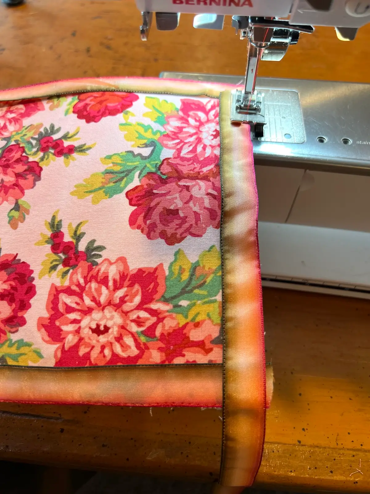 Sewing the trim on the fabric box top