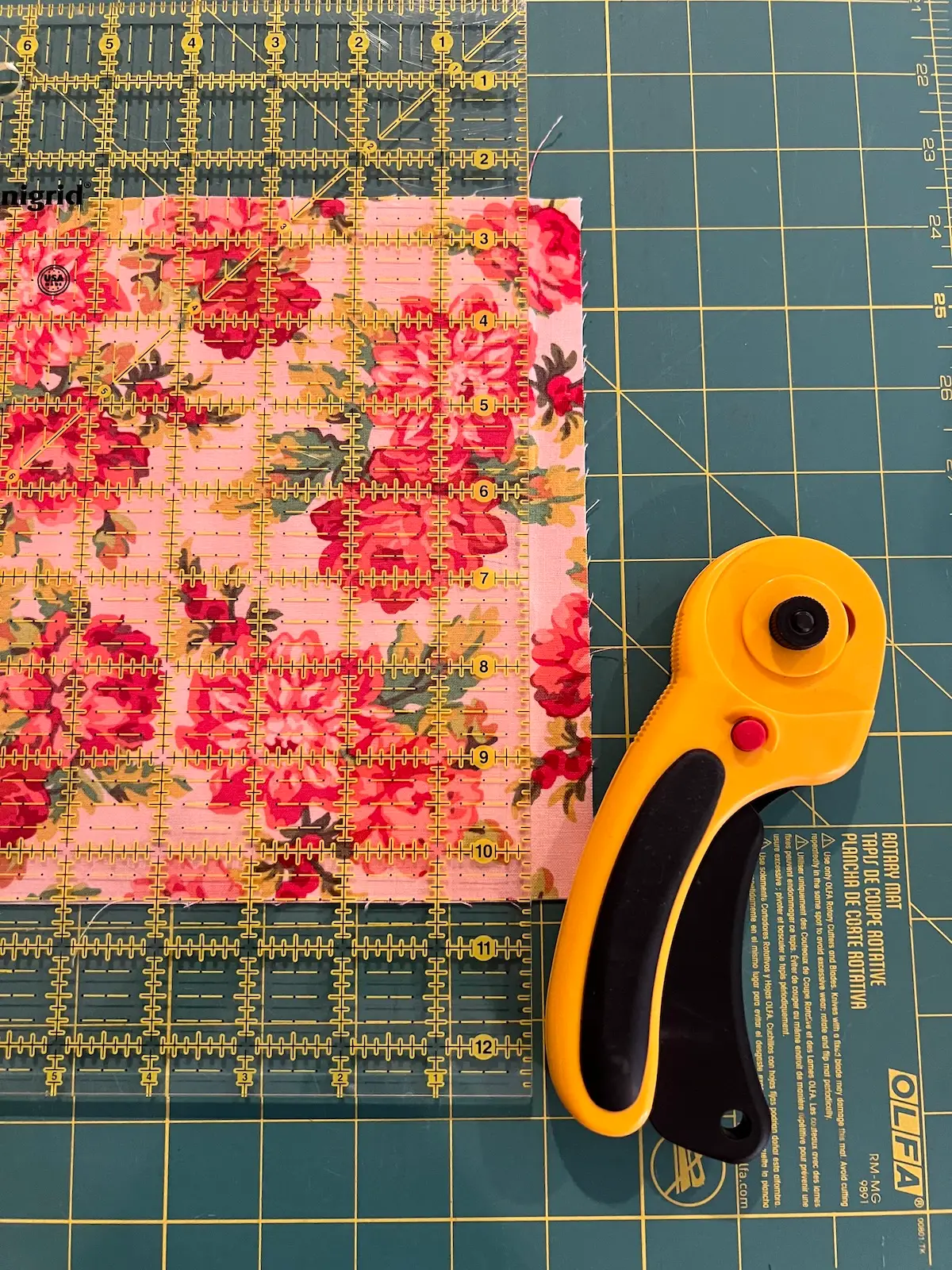 Trimming the excess fabric from the box top