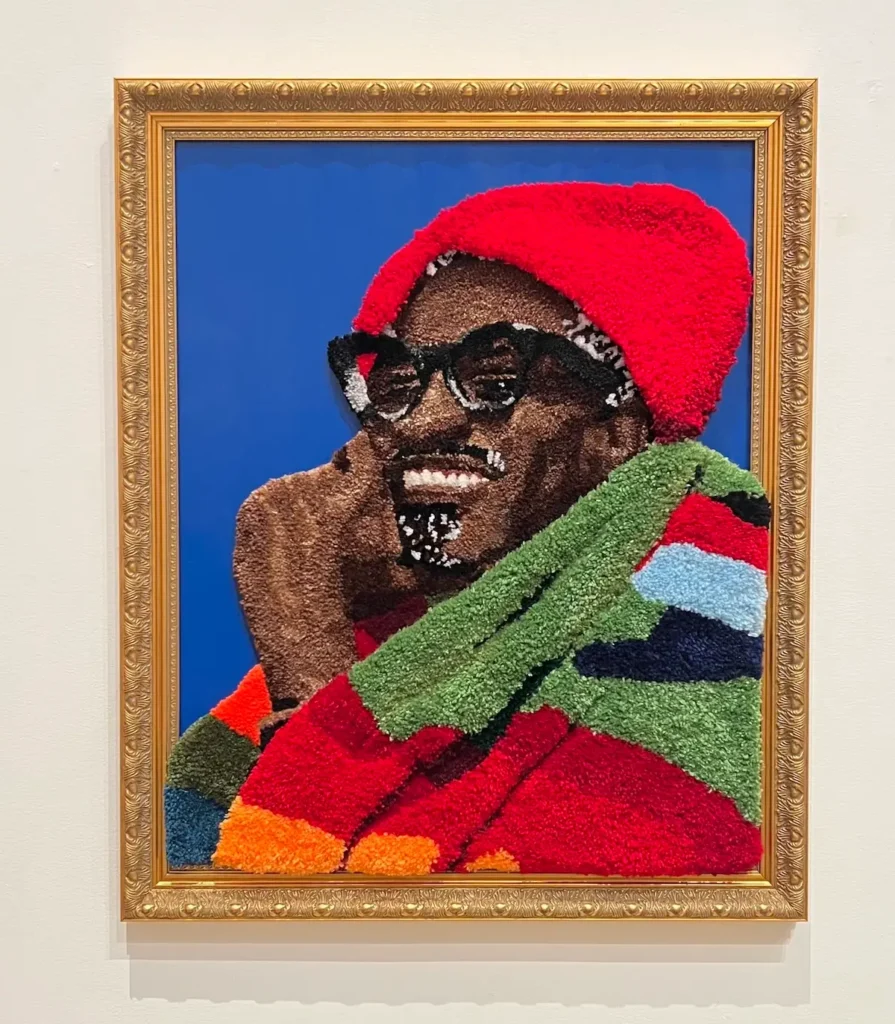 Portrait made by rug tufting by Kid Kardiac