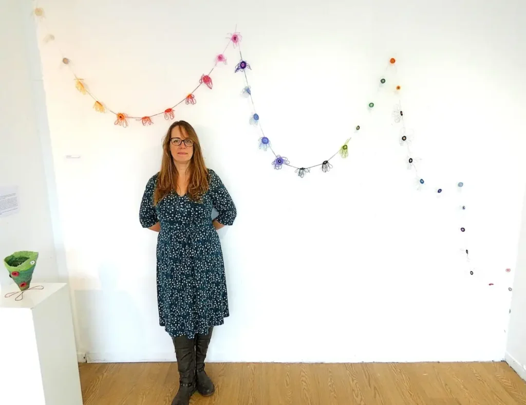 Lucy Sugden with her Chain in her solo Exhibition Quietly