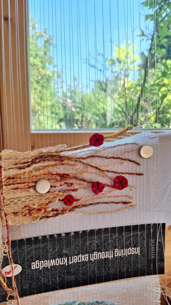 Small meadow on loom by Lucy Sugden