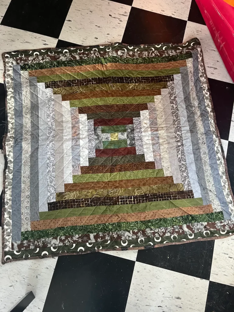 Courthouse steps quilt by Scot Augustston