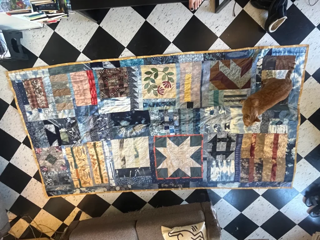 Belize city clothesline quilt by Scot Augustston