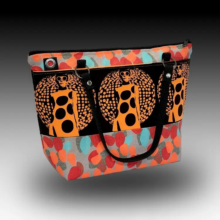 Handbag with lady in polka dot dress made by Scotty Jones