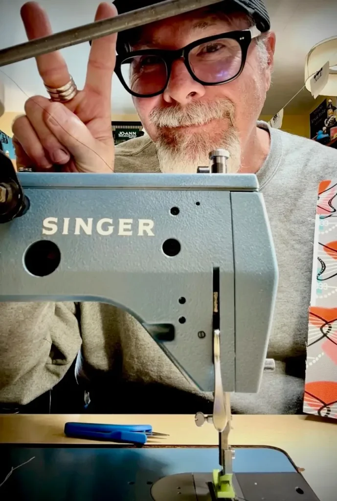 Scotty Jones at his sewing machine
