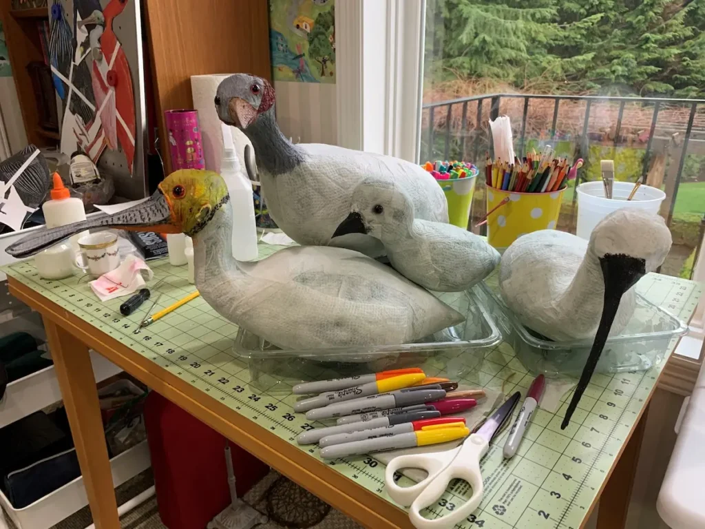 Serap Whitmer showing four birds working in progress