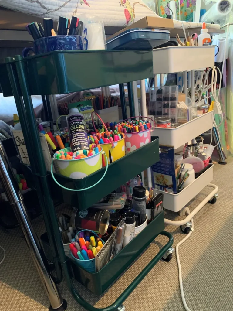 Carts holding supplies in Serap Whitmer studio