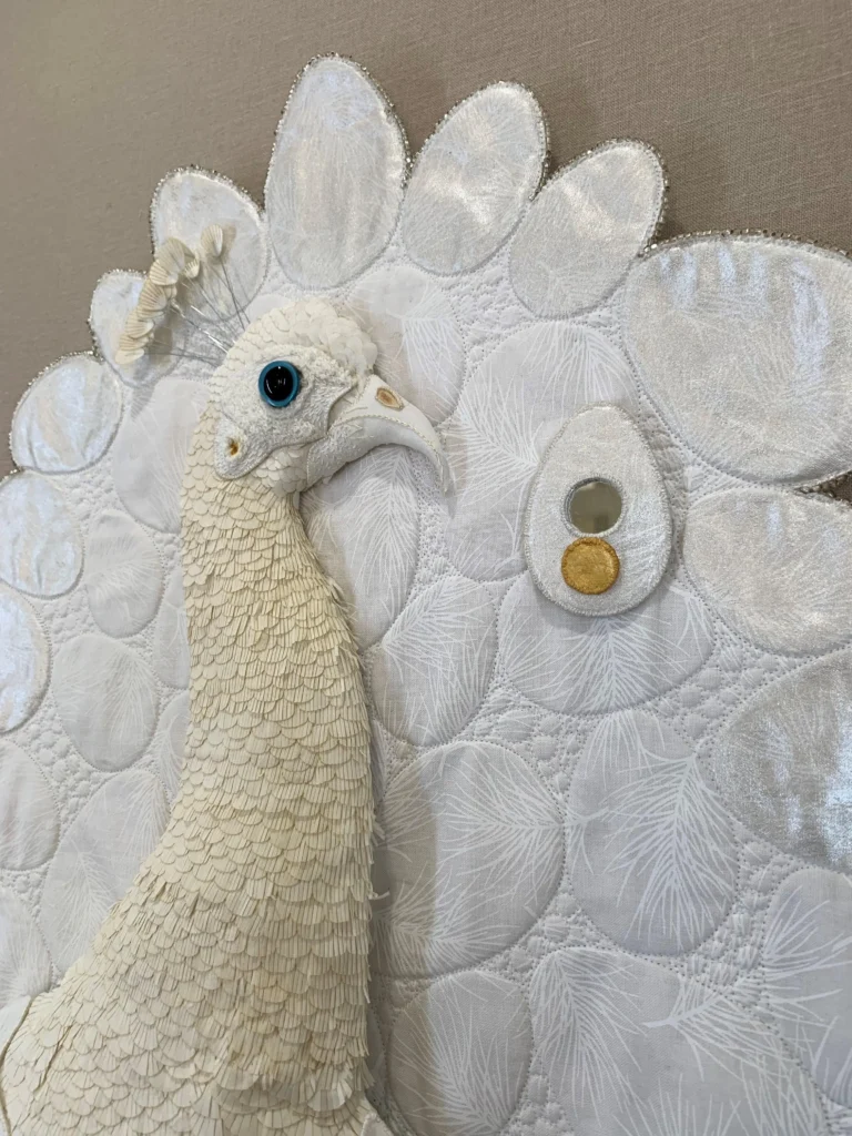 Detail, peacock fiber art by Serap Whitmer