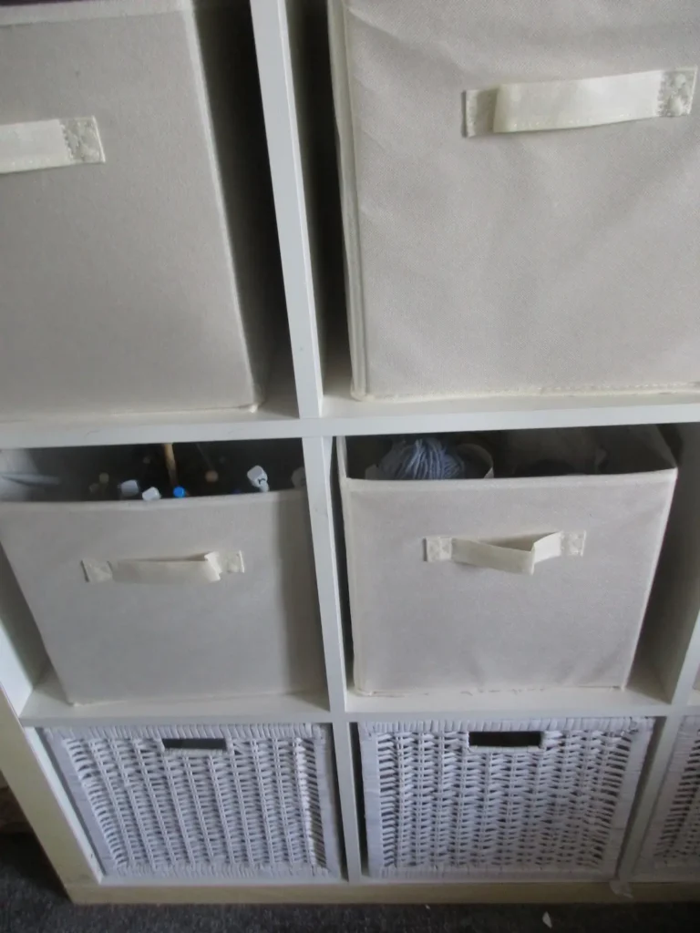 Showing the shelves where Sian Brown stores her yarn in bins
